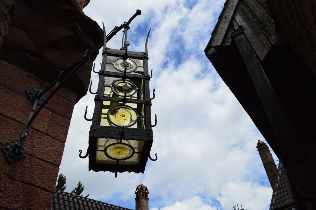 vintage iron street lamp hanging in alsace town