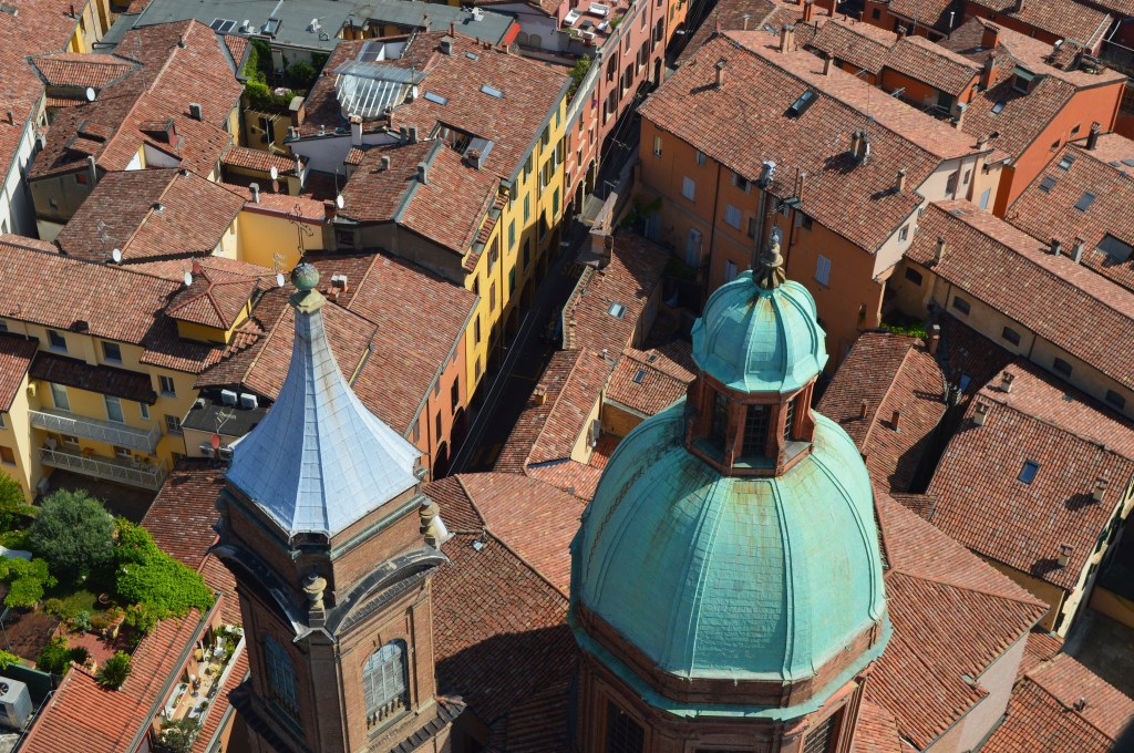 Dome and portico-lined streets of Bologna, Italy