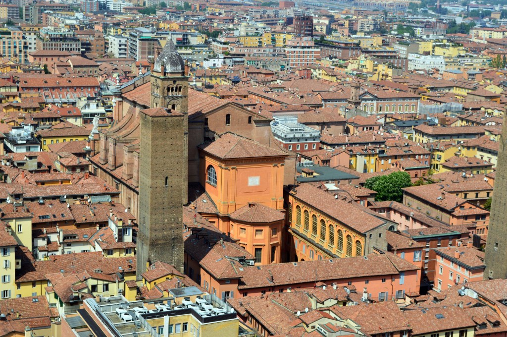 Aerial view of Bologna with medieval towers and red rooftops