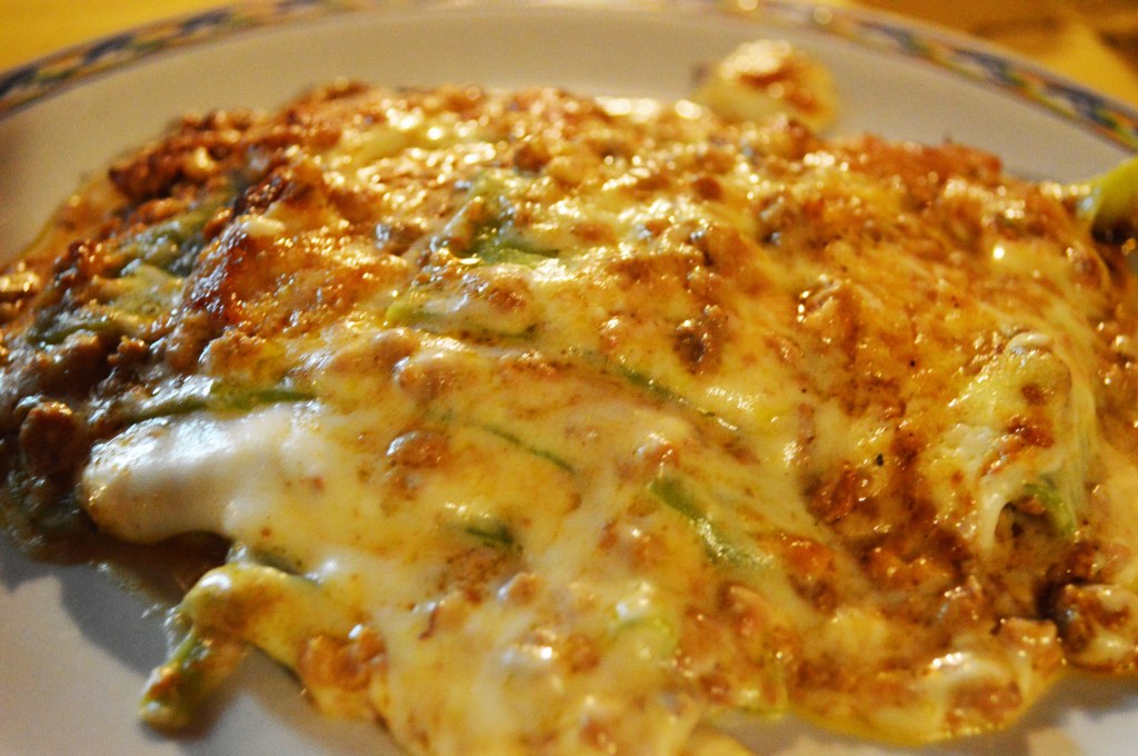 Traditional Bolognese lasagna with melted cheese