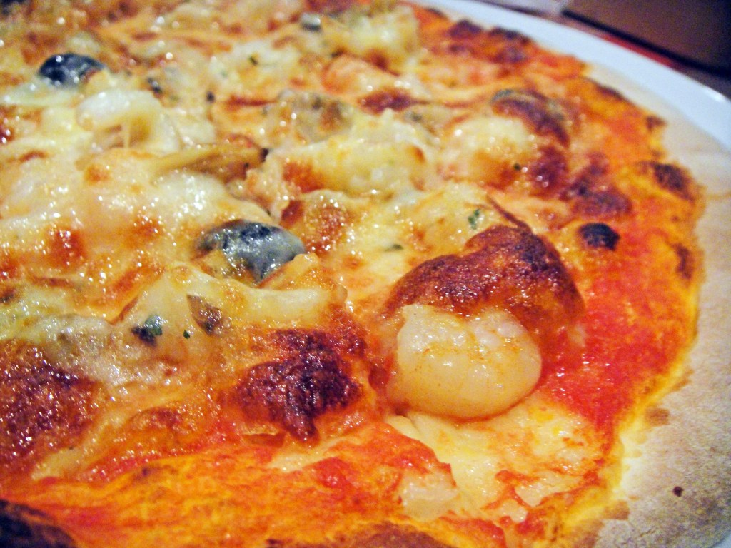 Delicious seafood pizza with shrimp and mussels – Authentic Italian cuisine