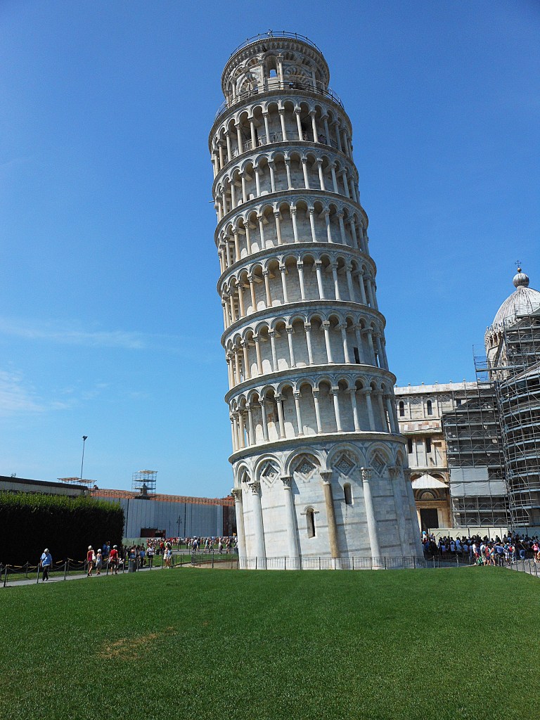 The Leaning Tower of Pisa against a clear blue sky