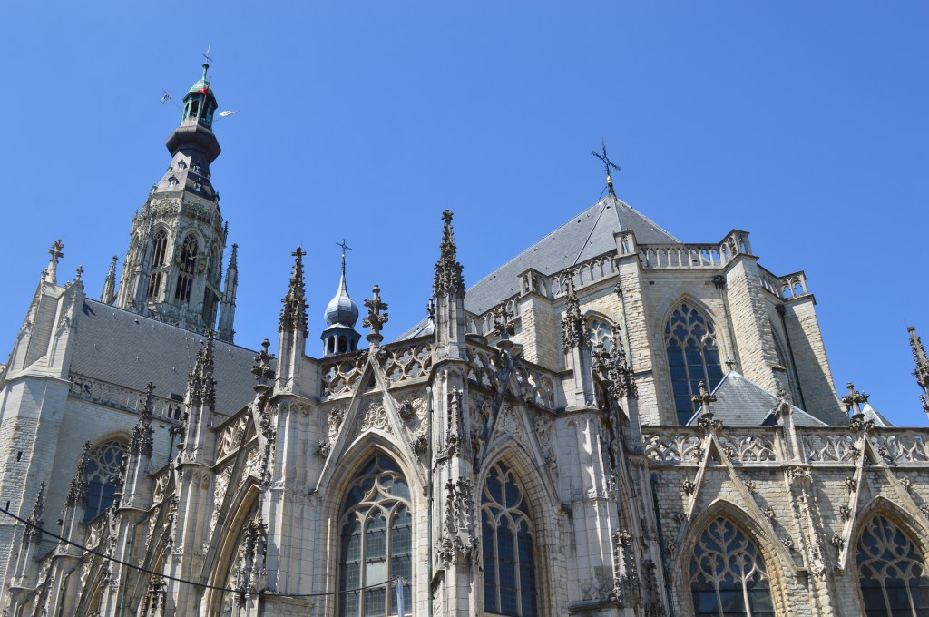 grote kerk in breda netherlands with gothic architecture and clear blue sky