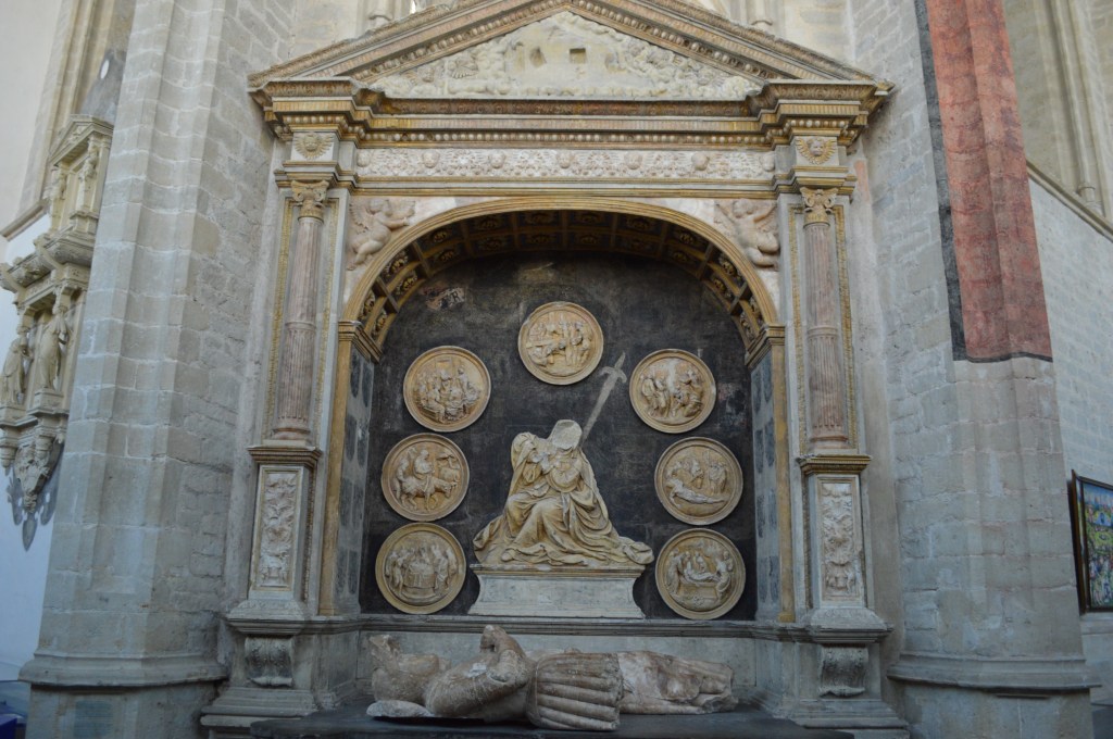 detailed stone sculpture and religious medallions on grote kerk breda wall