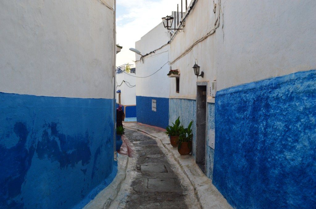 Narrow blue and white alleyway in Morocco – Traditional Medina architecture