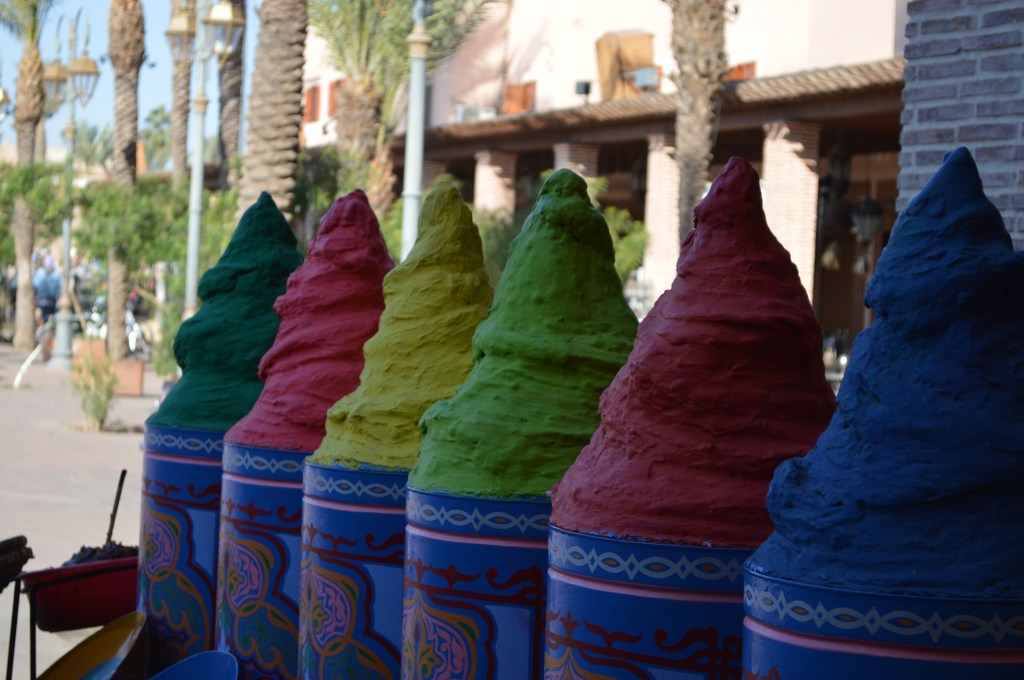 Colorful spices and traditional pigments in a Moroccan market
