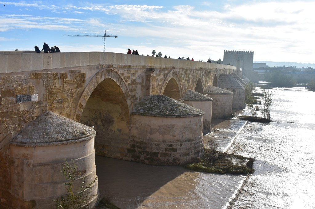roman bridge of córdoba crossing the guadalquivir river – ancient stone structure