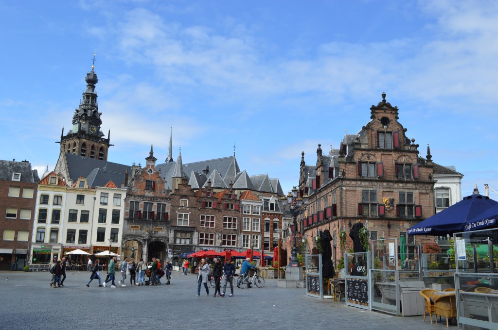 historic city center of nijmegen with traditional dutch buildings and lively square