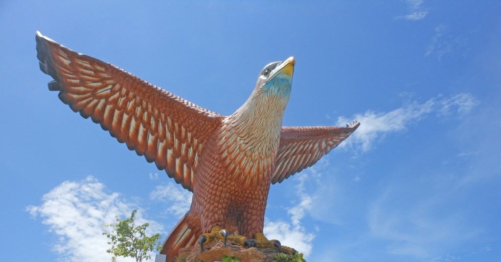 A close-up view of the giant eagle statue at Eagle Square in Langkawi, Malaysia.