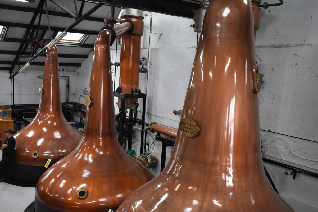 Copper whiskey stills used in distillation process at an Islay distillery – Islay stock photos