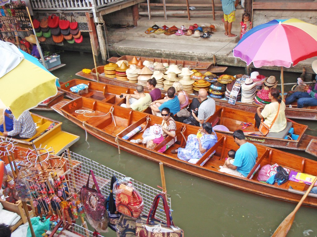 Floating market in Bangkok, Thailand – Wooden boats selling traditional Thai handicrafts and food