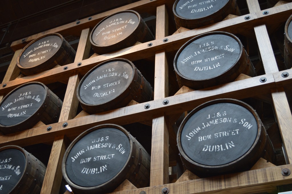 Wooden whiskey barrels at the Jameson Distillery in Dublin, Ireland. - Ireland stock photos