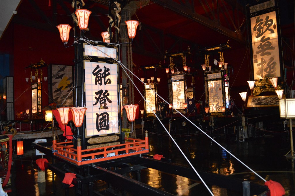 Traditional illuminated Kiriko lantern floats displayed indoors during Wajima Kiriko Festival in Japan - Wajima stock photos