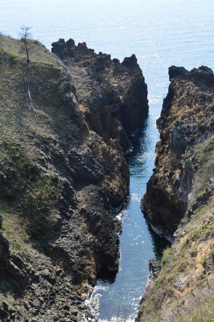 Narrow rocky sea inlet with jagged cliffs at Noto Kongo, Wajima, Ishikawa, Japan - Wajima stock photos