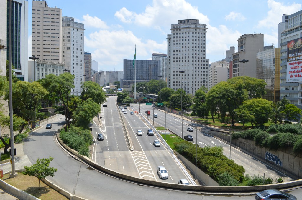 Urban traffic and high-rise buildings in downtown São Paulo, Brazil – travel stock image