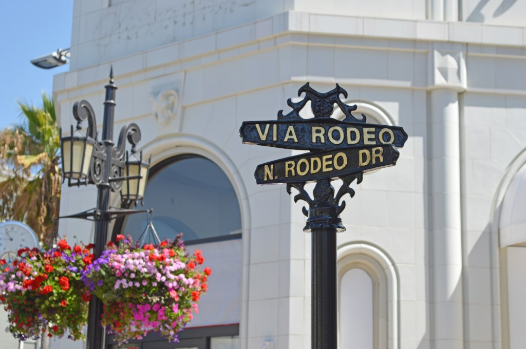 Via Rodeo and North Rodeo Drive street sign in Beverly Hills, Los Angeles – America stock photos