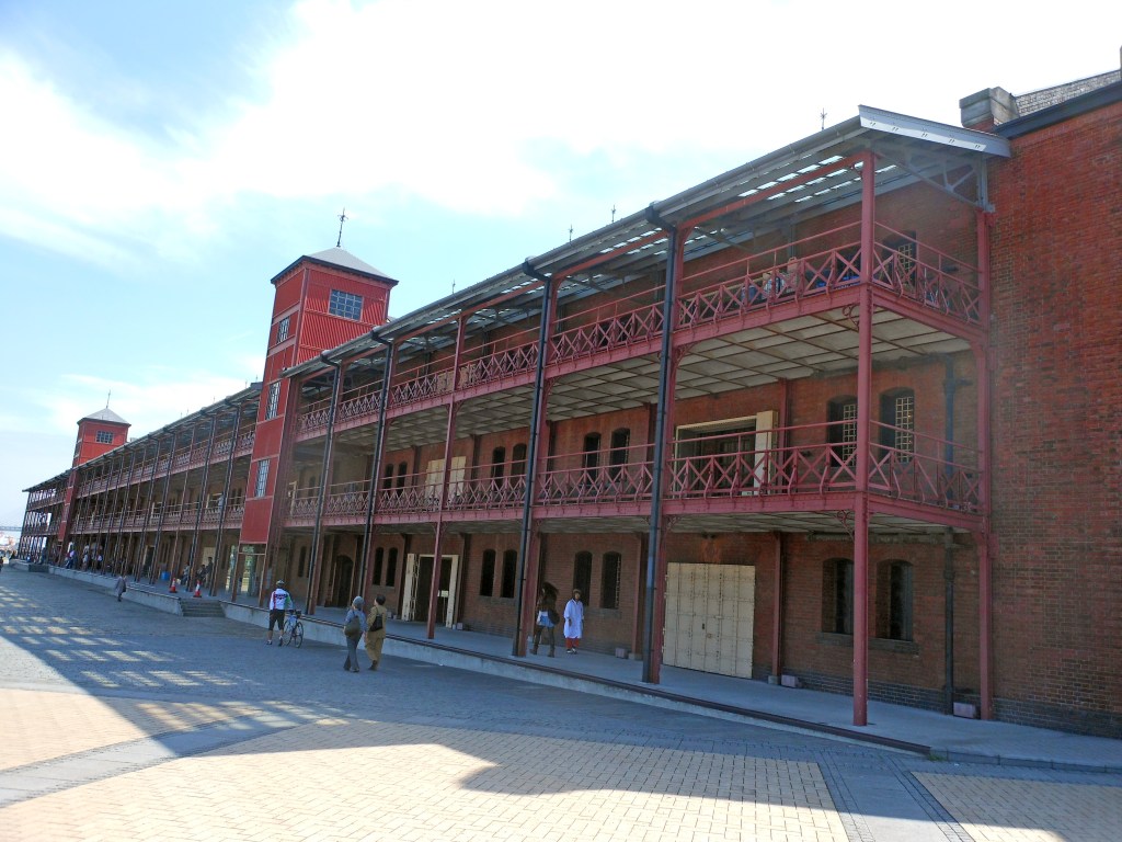 Exterior of Yokohama Red Brick Warehouse with visitors strolling – Yokohama stock photos